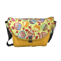 A bolsa mensageiro amarela das cerejas dos cupcake