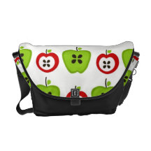 A bolsa mensageiro vermelha e verde das maçãs