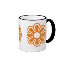 A laranja floresce a caneca de café da campainha