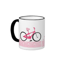 Bicicleta cor-de-rosa canecas