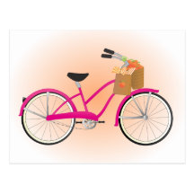 Bicicleta do rosa quente com laranjas cartoes postais