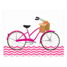 Bicicleta do rosa quente com laranjas cartao postal