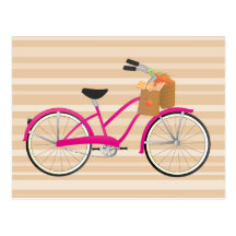 Bicicleta do rosa quente com laranjas cartões postais
