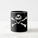 Caneca do crânio e de café dos ossos