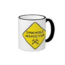 Caneca do inspector do Sinkhole