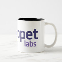 Caneca do logotipo dos laboratórios do fantoche