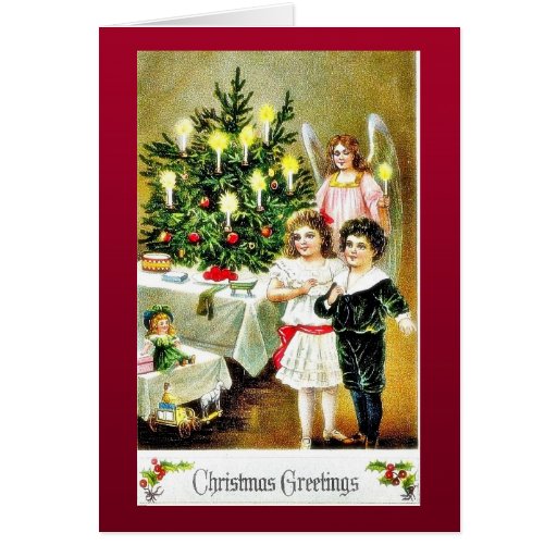 Cumprimento do Natal com dois praying e anjos dos  Cartão