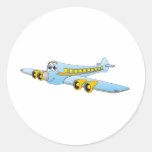 Desenhos animados azuis do avião de passagem O Adesivo Em Formato Redondo