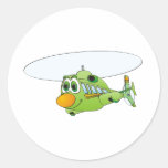 Desenhos animados verdes do helicóptero adesivos redondos