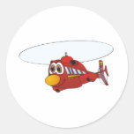 Desenhos animados vermelhos do helicóptero adesivo redondo