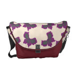Design artístico da borboleta sobre o branco antig bolsas mensageiro