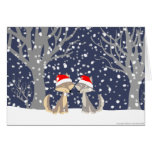 Dois lobos no cartão do Natal do inverno