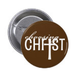 Escolhendo o botão do cristo pins