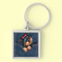 Filhote de cachorro de Yorkie no bolso porta chaves
