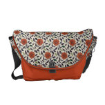 Floral alaranjado frondoso bolsas mensageiro