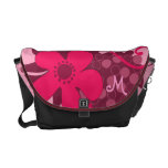 Flores retros na moda e bolsa mensageiro do monogr