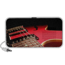 Foto vermelha brilhante da guitarra elétrica caixinhas de som para notebook