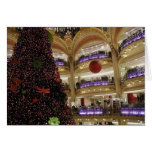 Natal no cartão do cumprimento/nota de Paris