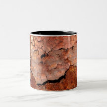 O cobre oxidado lasca-se caneca