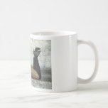 O gato de encontro caneca