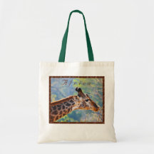 O girafa ensaca as bolsas de compra reusáveis bara