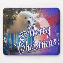O papai noel entrega o filhote de cachorro do Nata Mouse Pad