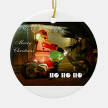 O papai noel inflável monta um Motocycle Ornamentos