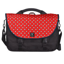 O vermelho pontilha o saco do laptop do computador
