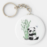 Panda que come o bambu chaveiro