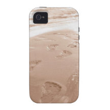 pegadas do caso do iPhone na areia