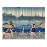 Pessoas que andam na chuva por Utagawa, Kuniyoshi Cartao Postal