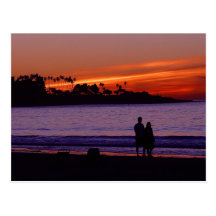 Por do sol da praia cartoes postais