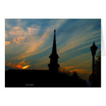 Por do sol na rua principal ocidental cartão