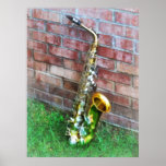 Saxofone contra o tijolo poster