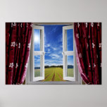 Window view onto arable farmland and blue skies