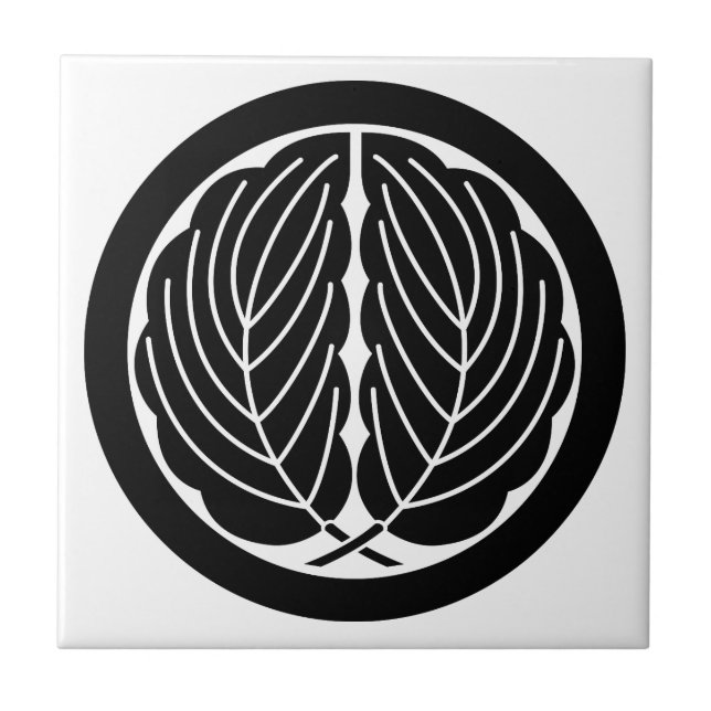 丸に抱き柏 (Frente)