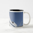 Pesquisar por avião de papel canecas Estacionado