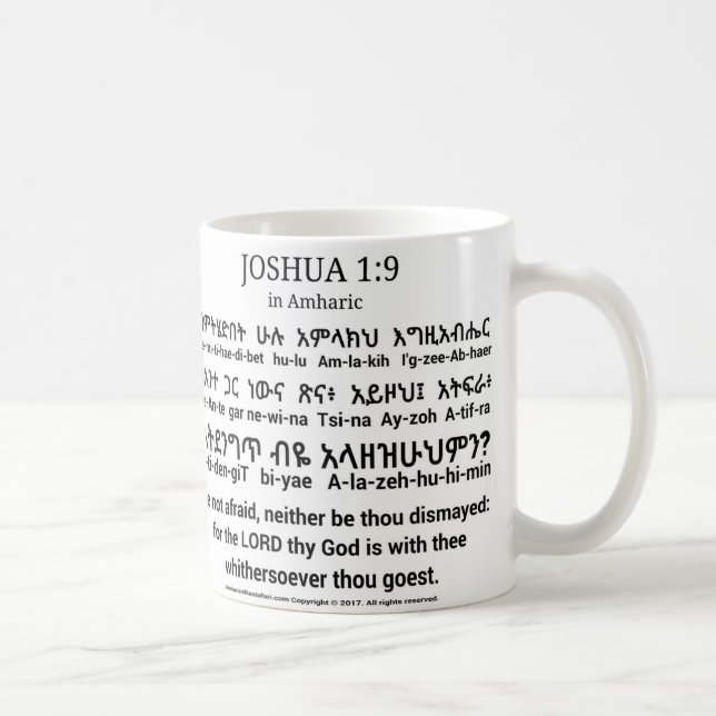 1:9 de Joshua na caneca do clássico do Amharic (Direita)