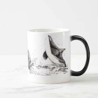 3 orcas que jogam a caneca Morphing
