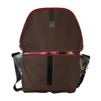 A bolsa mensageiro das botas de vaqueiro