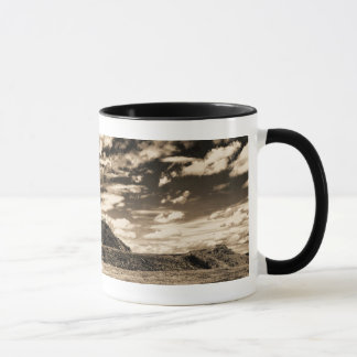 A caneca do castelo da sandália do reivindicador