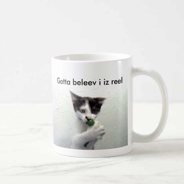 A caneca do lolcat de Kiko "obteve-me ao beleev (Direita)