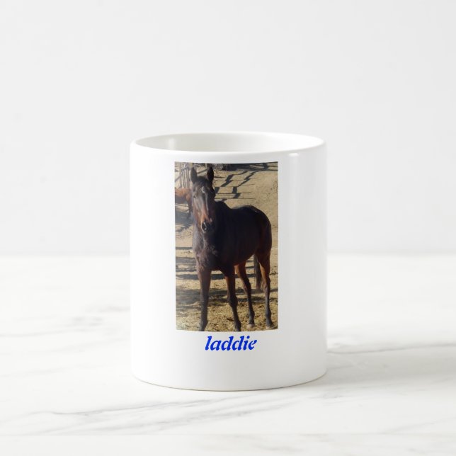 A caneca dourada "Laddie " da cenoura (Centro)