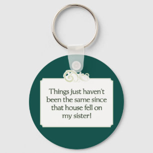 A casa caiu em minha irmã. chaveiro