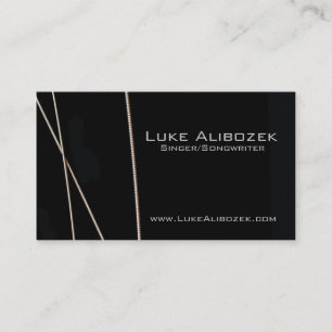 A guitarra amarra o cartão do músico