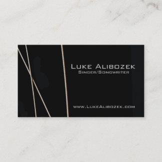 A guitarra amarra o cartão do músico