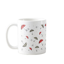 A pequena caneca de guarda-chuva vermelha