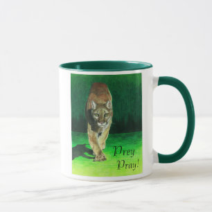 A rapina Pray a caneca do leão de montanha