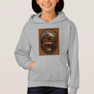 A solid color circular mountain t-shirt logo.