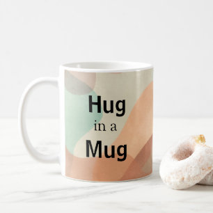Abraço numa caneca de café